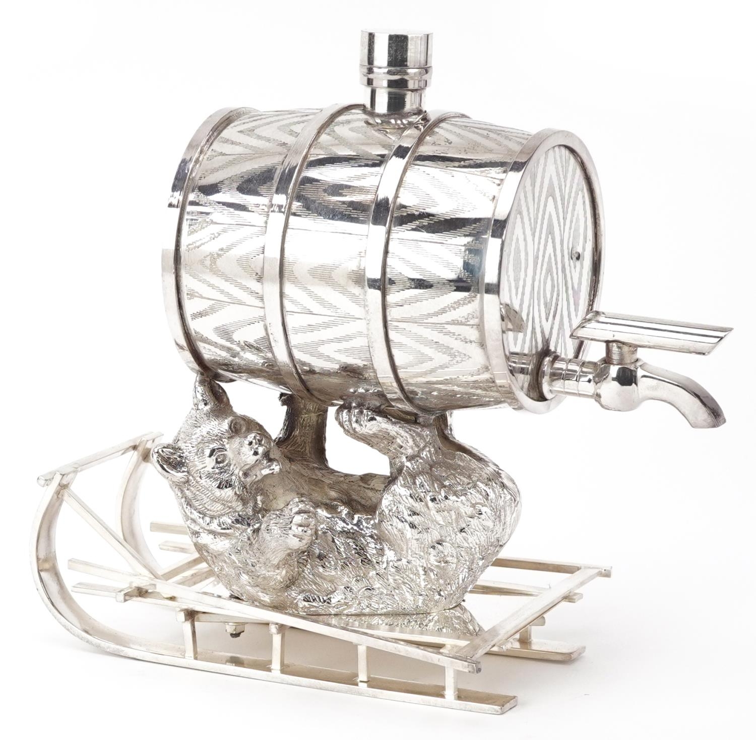 Silver plated barrel design dispenser in the form of a bear cub on a sled, 21cm high