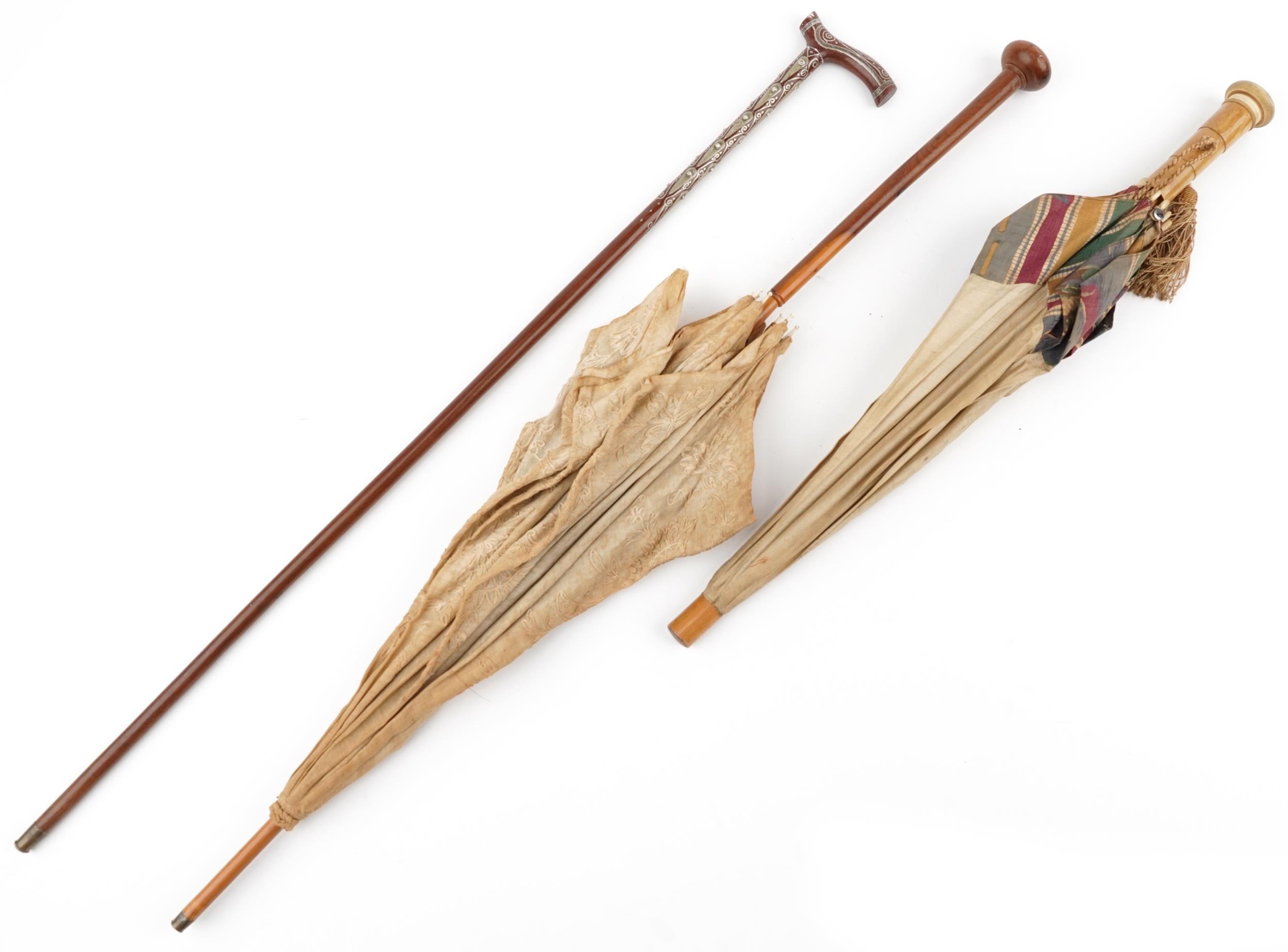 Two early 20th century parasols and a Middle Eastern hardwood walking stick with foliate metal - Image 2 of 7