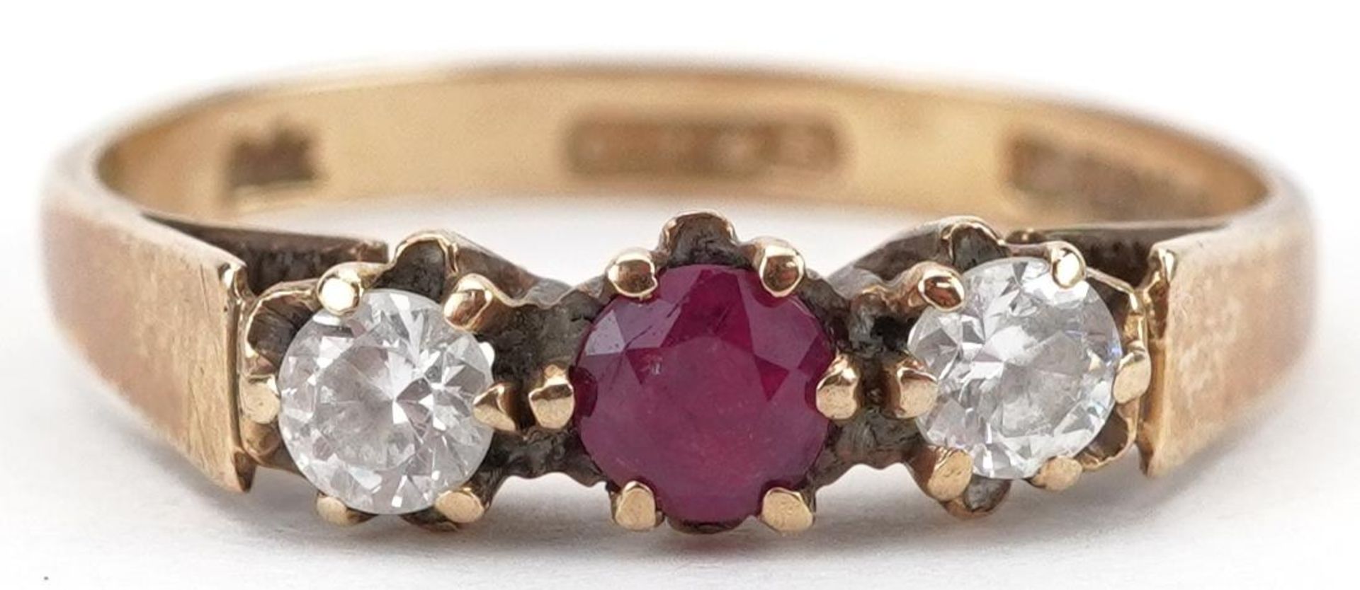9ct gold pink topaz and cubic zirconia three stone ring, size K, 1.4g