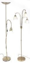 Two brass standard lamps including a three branch example with frosted glass shades, 179.5cm high