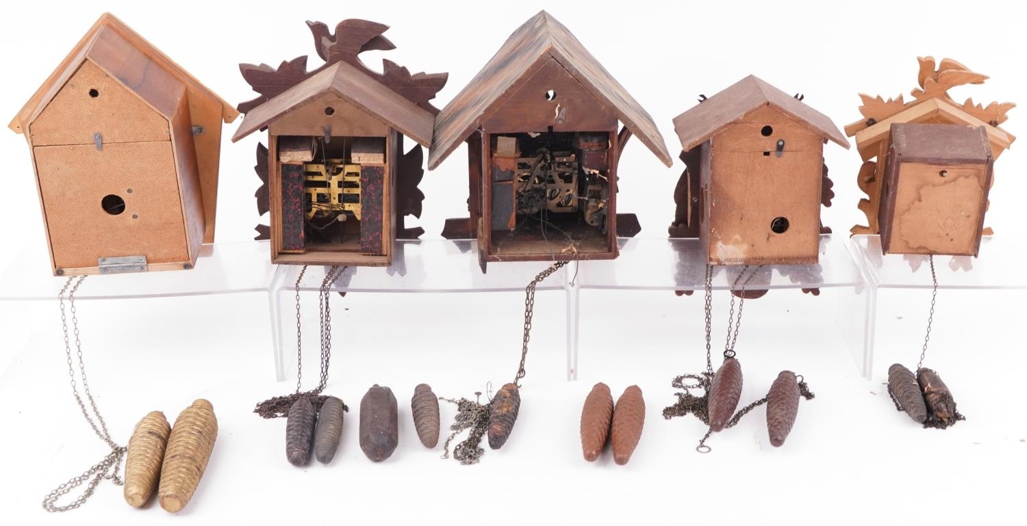 Four German carved Black Forest cuckoo clocks and a Russian USSR example by Veaga, the largest - Image 7 of 10