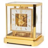 Jaeger LeCoultre brass cased Atmos clock with square dial having Arabic numerals, serial number
