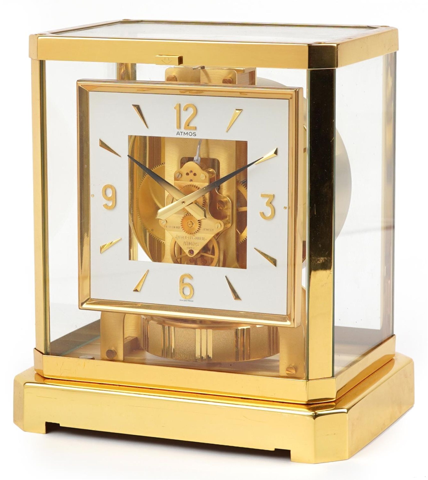 Jaeger LeCoultre brass cased Atmos clock with square dial having Arabic numerals, serial number