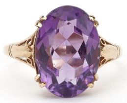 9ct gold amethyst ring with pierced shoulders, the amethyst approximately 14.10mm x 10.0mm x 6.