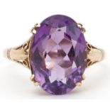 9ct gold amethyst ring with pierced shoulders, the amethyst approximately 14.10mm x 10.0mm x 6.