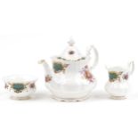 Royal Albert Berkeley teapot, milk jug and sugar bowl, the teapot 25cm in length