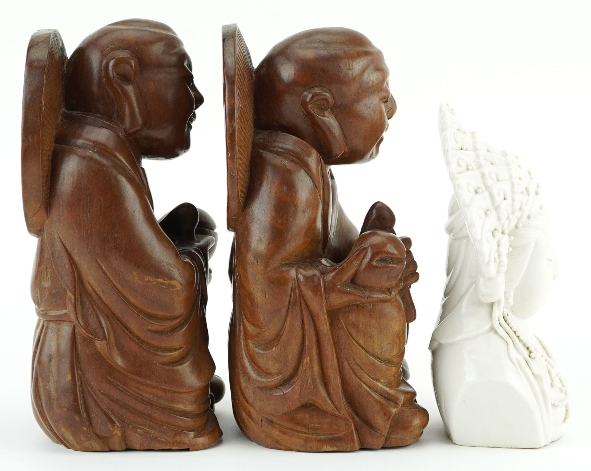 Pair of Chinese hardwood carvings of Buddha and blanc de chine glazed porcelain bust of Guanyin, the - Image 4 of 7