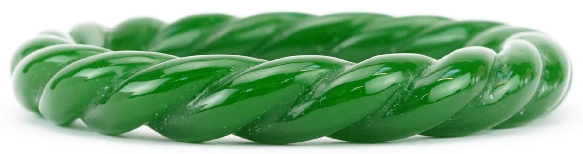 Chinese green jade rope twist bangle, 8cm in diameter, 47.0g