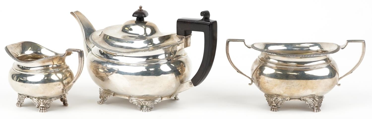 Daniel & John Wellby, Victorian silver three piece tea service, the teapot with wooden handle and - Image 4 of 6