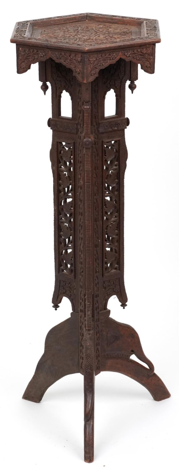 Anglo Indian plant stand profusely carved with flowers and foliage, 100cm high