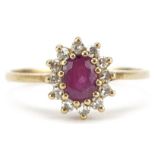 9ct gold ruby and diamond cluster ring, each diamond approximately 1.20mm in diameter, the ruby