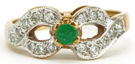 9ct gold emerald and diamond double crossover ring, size O/P, 3.3g
