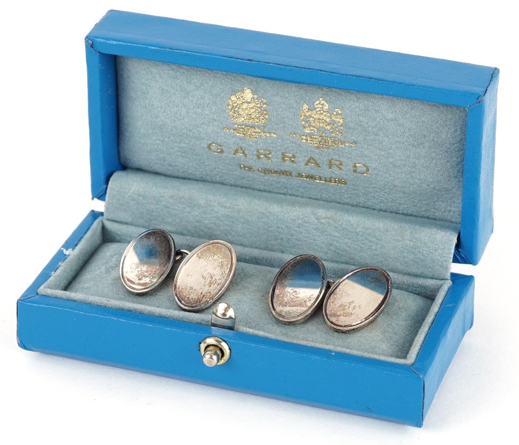 Garrard & Co, pair of unengraved silver cufflinks with fitted case, each 2.5cm in length, total 12.