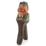 Pair of painted Black Forest carved wood nut crackers in the form of a man, 21.5cm high