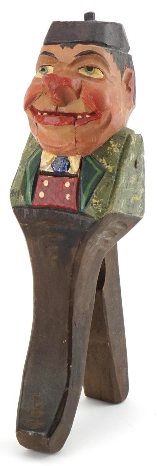 Pair of painted Black Forest carved wood nut crackers in the form of a man, 21.5cm high