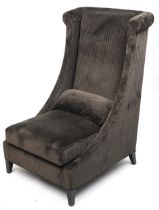 Contemporary dark olive green upholstered throne lounge chair with ebonised legs and cushion,