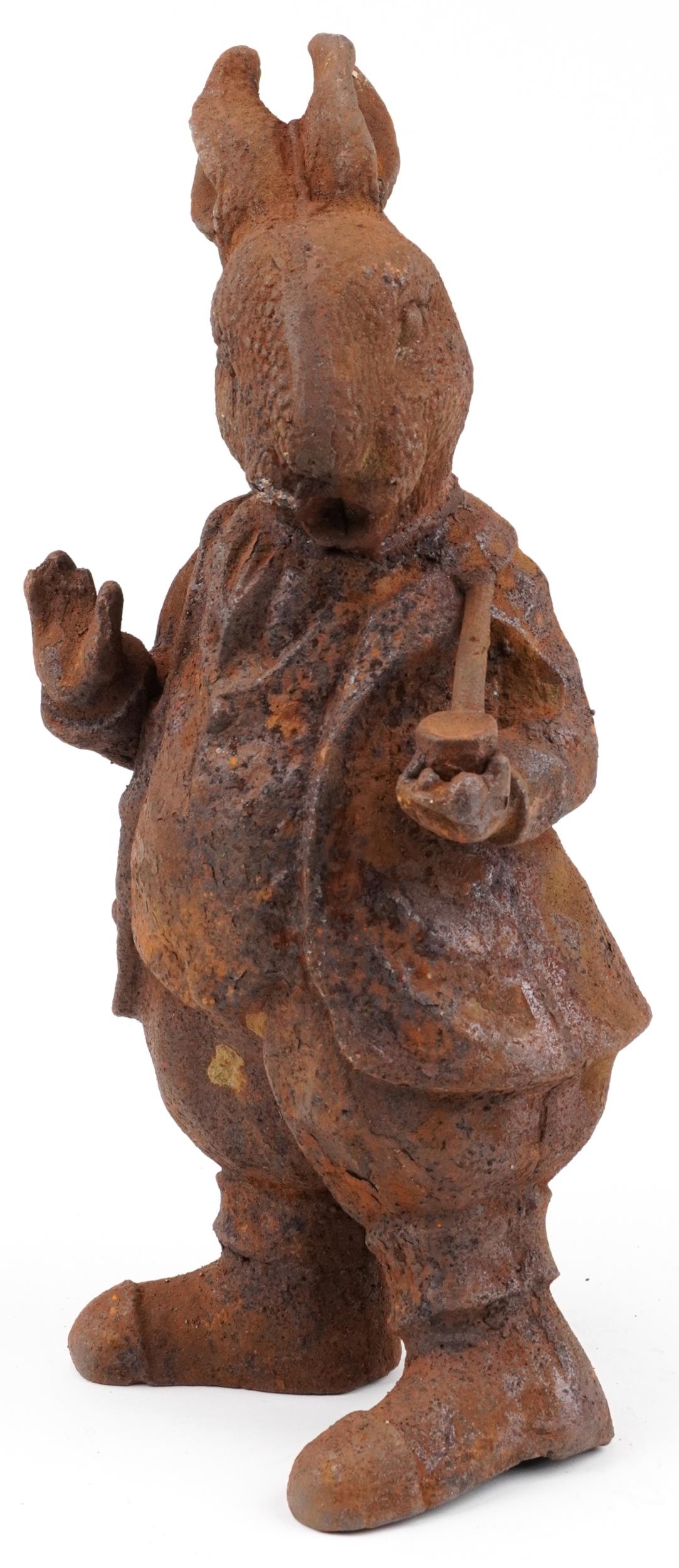 Garden cast iron comical rabbit smoking a pipe, 43cm high