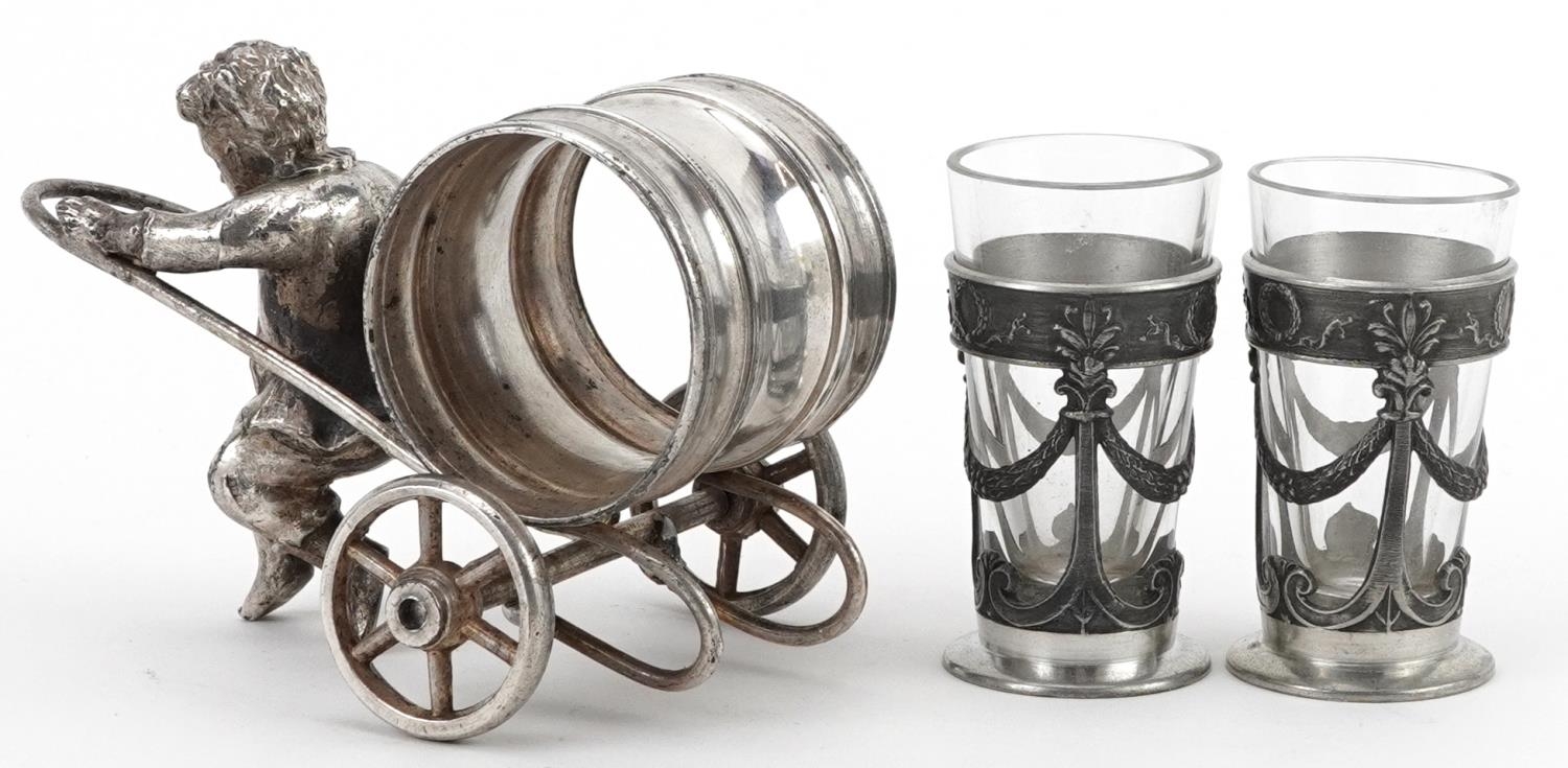Silver plated napkin holder in the form of a boy pulling a cart and a pair of pewter and glass - Image 2 of 3