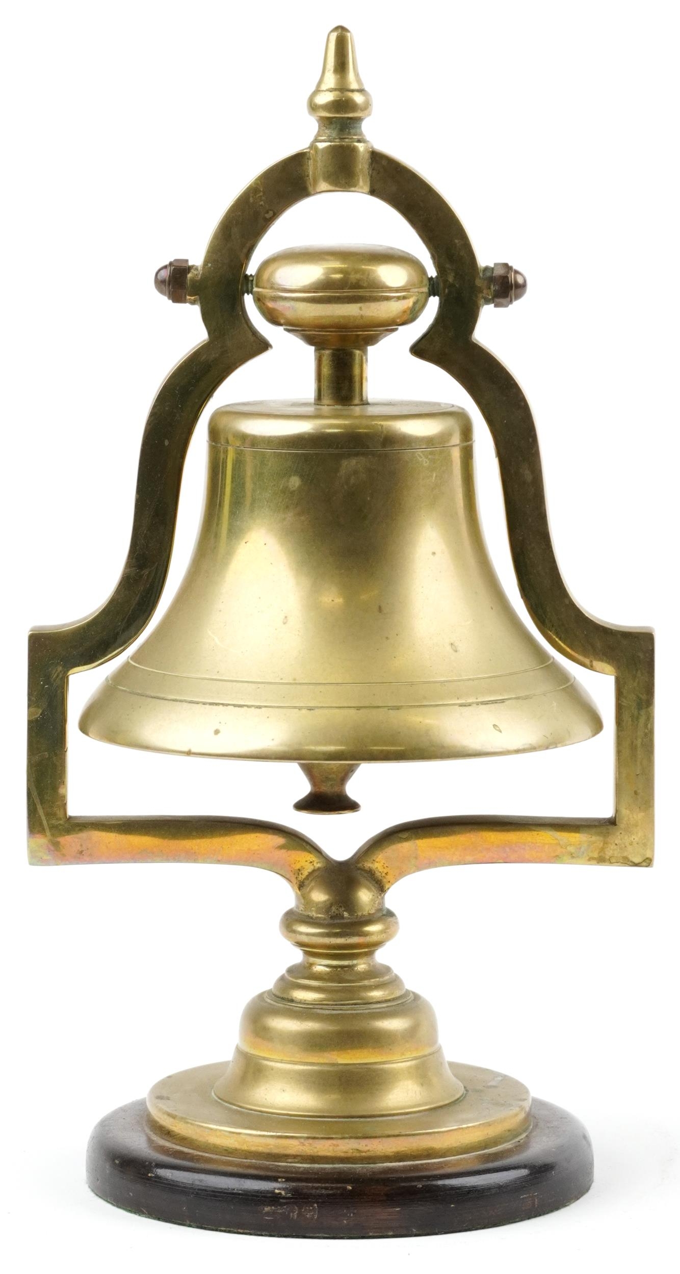 19th/20th century railwayana interest brass railroad bell raised on a circular mahogany base, 34cm - Image 2 of 3