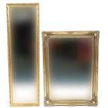 Two rectangular gilt framed wall mirrors with bevelled glass, 127cm x 37.5cm and 91cm x 65.5cm