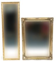 Two rectangular gilt framed wall mirrors with bevelled glass, 127cm x 37.5cm and 91cm x 65.5cm