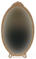 Ornate gilt framed easel oval dressing table mirror, 47cm high