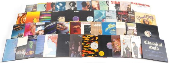 Vinyl LP records including Frank Sinatra, Rod Stewart, David Bowie, Electric Light Orchestra and The