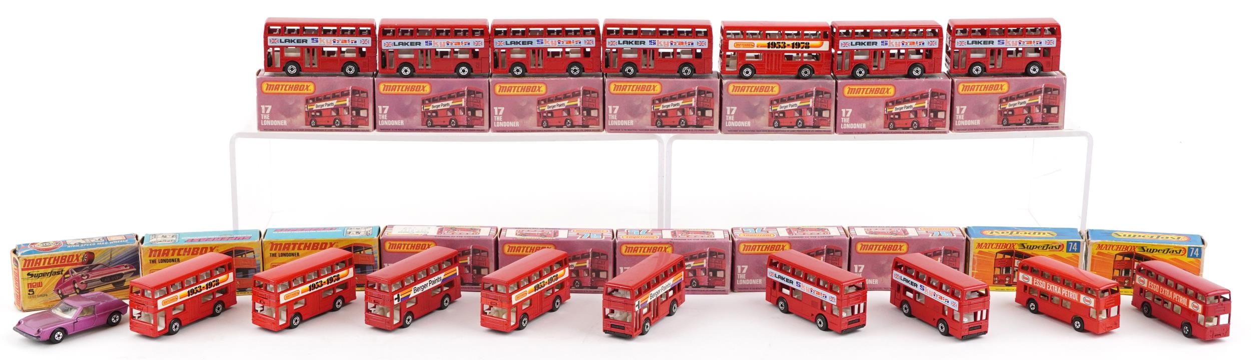 Seventeen vintage Matchbox diecast vehicles with boxes including sixteen Buses, numbers 17, 74 and 5