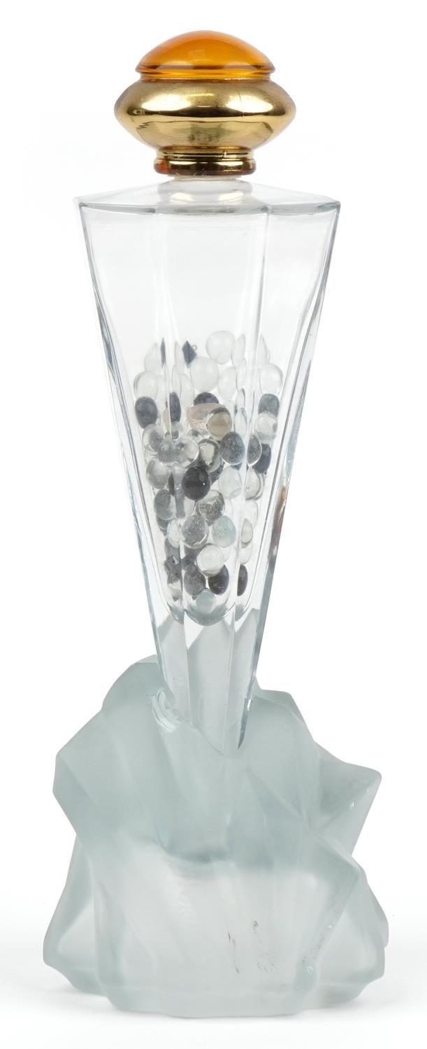 Large shop dummy display scent bottle on naturalistic rocky frosted glass base, overall 41cm high