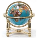 Contemporary polished stone table globe with brass stand and compass under tier, 33cm high