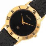 Gucci, ladies gold plated Gucci 3000J quartz wristwatch having Roman numerals to the bezel, serial