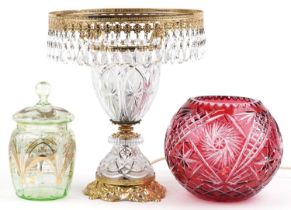 Glassware including Bohemian ruby overlaid cut glass vase and a glass and brass lamp with drops, the