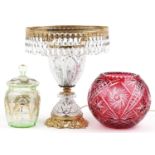 Glassware including Bohemian ruby overlaid cut glass vase and a glass and brass lamp with drops, the