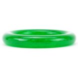 Chinese green jade bangle, 8.5cm in diameter, 74.5g