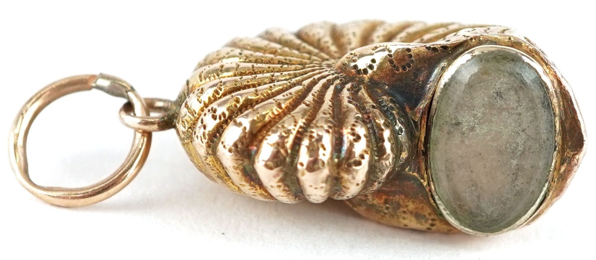 Antique unmarked gold mourning charm in the form of an ammonite, 1.9cm high, 1.3g - Image 3 of 3