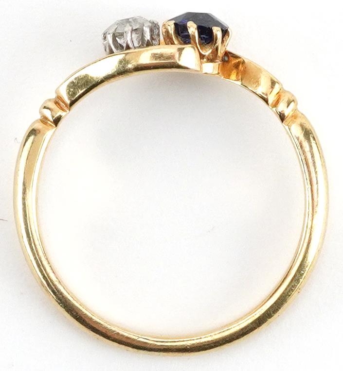 Unmarked gold diamond and sapphire crossover ring, tests as 18ct gold, the diamond approximately 0. - Image 3 of 3