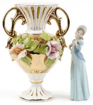 Large Italian floral encrusted vase with twin handles and a Nao figurine of a female wearing a white