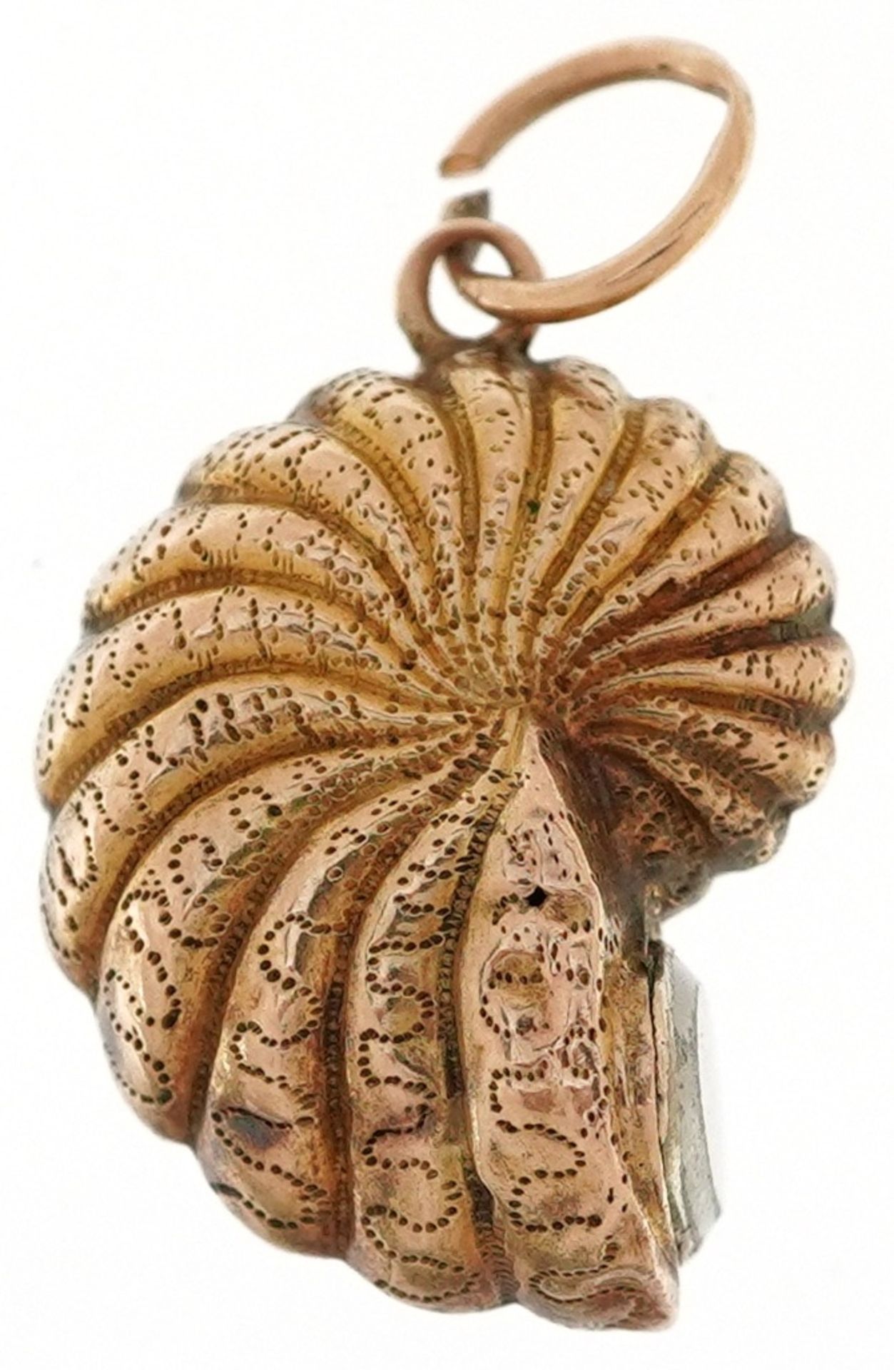 Antique unmarked gold mourning charm in the form of an ammonite, 1.9cm high, 1.3g