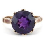 9ct gold amethyst solitaire ring, the amethyst approximately 10.10mm in diameter x 6.30mm deep, size