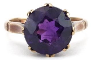 9ct gold amethyst solitaire ring, the amethyst approximately 10.10mm in diameter x 6.30mm deep, size
