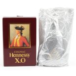 Bottle of Hennessey XO cognac with box housed in a sealed bag