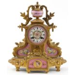 19th century French ormolu mantle clock striking on a bell having urn finial and Sevres type