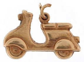 9ct gold charm in the form of a scooter, 1.8cm in length, 0.8g