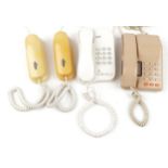 Four vintage telephones