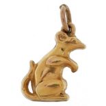 9ct gold charm in the form of a seated mouse, 1.5cm high, 0.9g