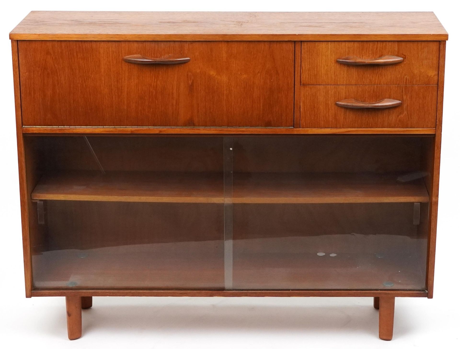 Avalon, mid century teak side cabinet fitted with a fall and two drawers above a pair of glass - Image 2 of 5