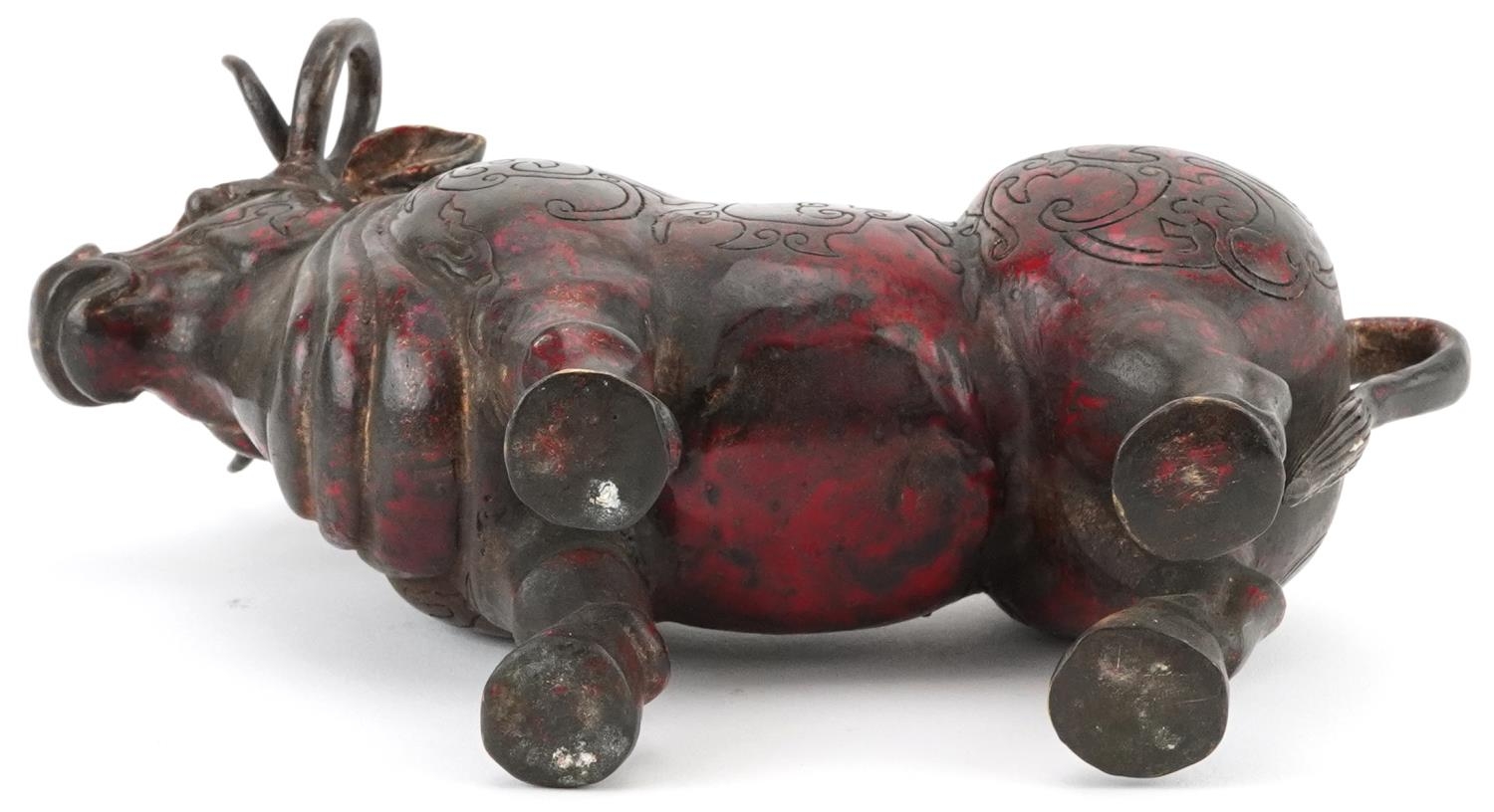 Chinese partially gilt and red lacquered bronze mythical animal, 22.5cm in length - Image 7 of 7