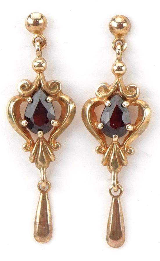 Pair of 9ct gold garnet teardrop earrings, each 3cm high, total 1.9g