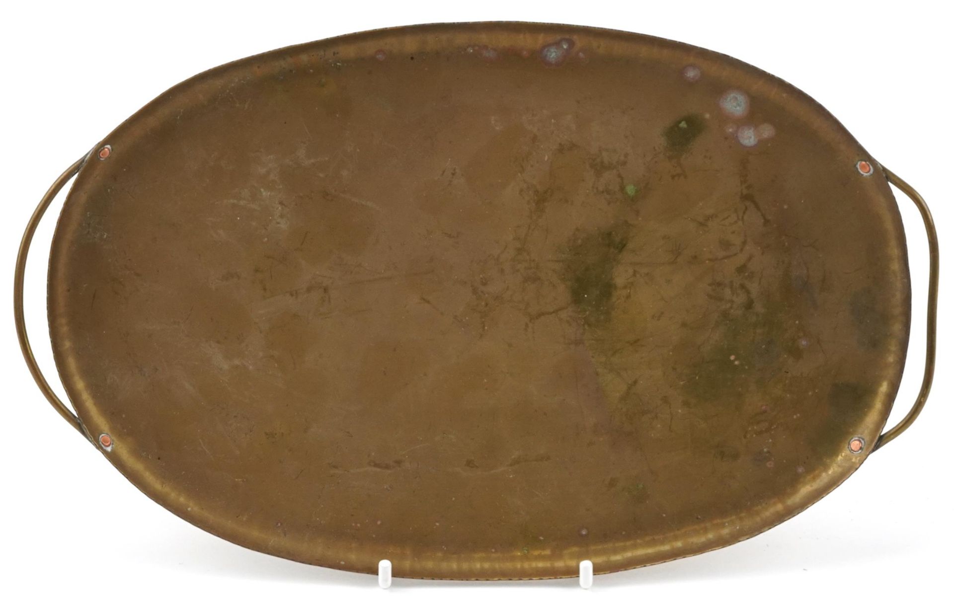 Arts & Crafts brass tray, initials to the reverse, 26cm wide