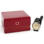 Omega, gentlemen's stainless steel manual wind wristwatch having Champagne dial, with box, the